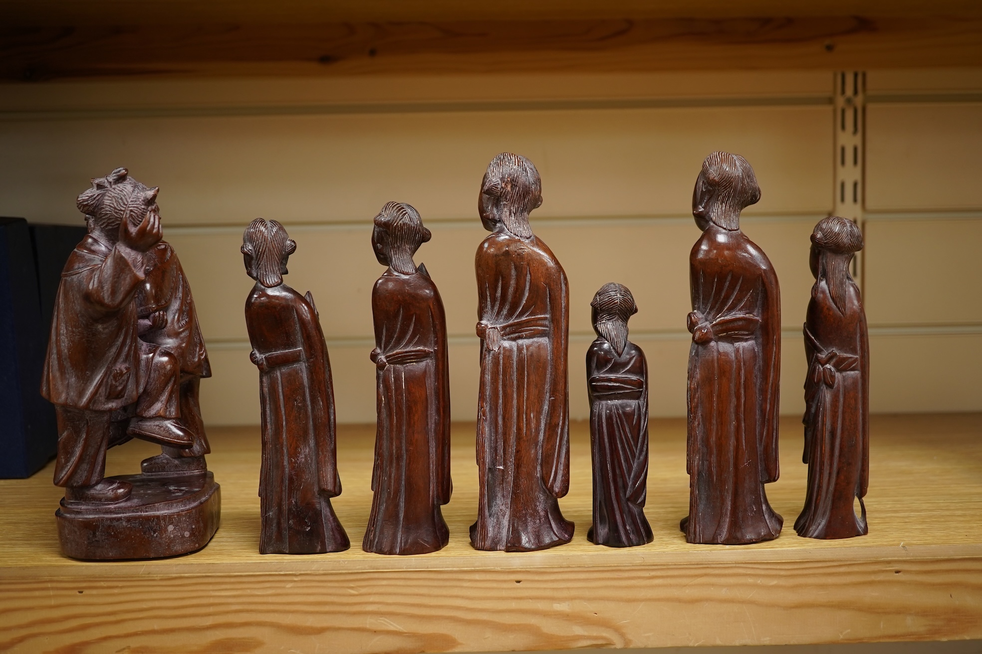 Six mid 20th century Chinese carved wood figures holding lotus and a Cultural Revolution carving of turin girls (7) tallest 21cm
